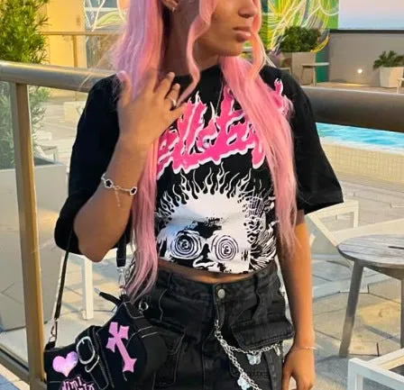 Bold Graphic Cartoon Print Cropped T-Shirt with Edgy Flair