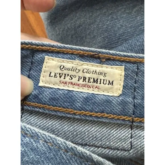 Levi’s PREMIUM Wedgie Straight Jeans Size 29 Button Fly Blue Distressed Raw Hem
