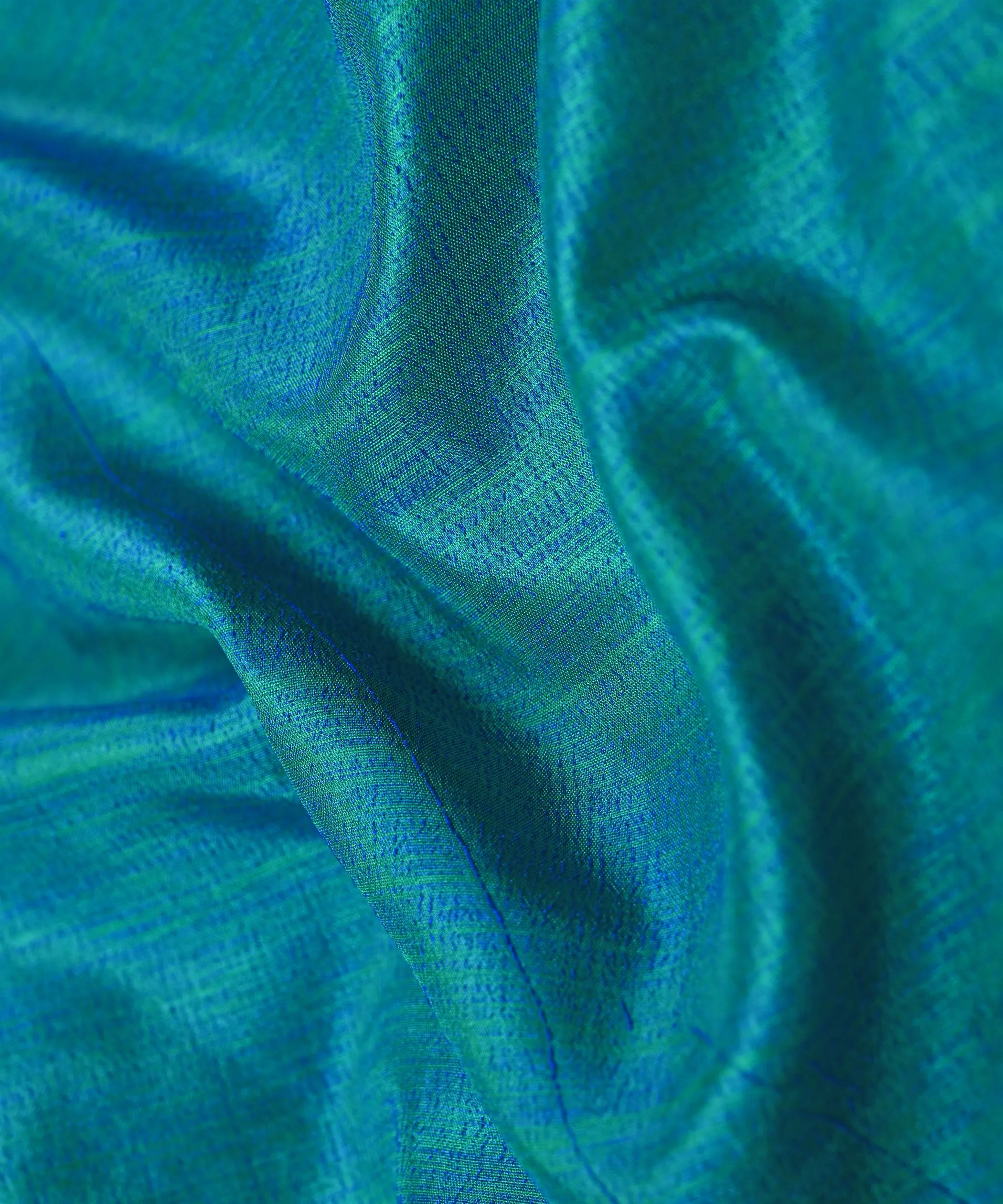 Peacock Blue Textured Semi Silk Fabric