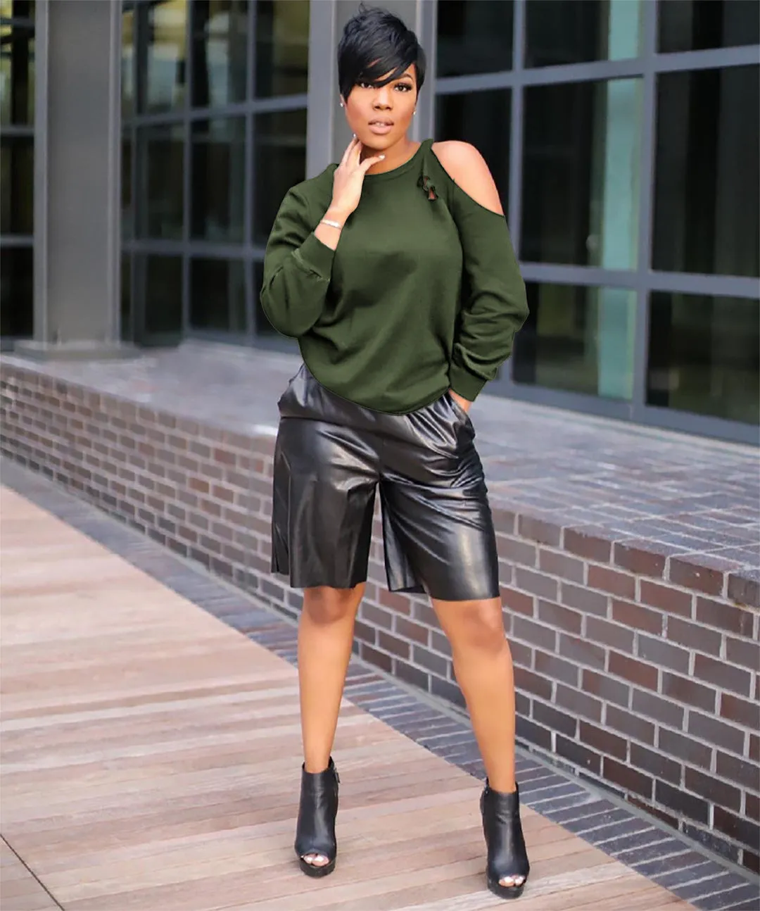 Stylish Cutout Round Neck Long Sleeve Top for Bold Casual Elegance