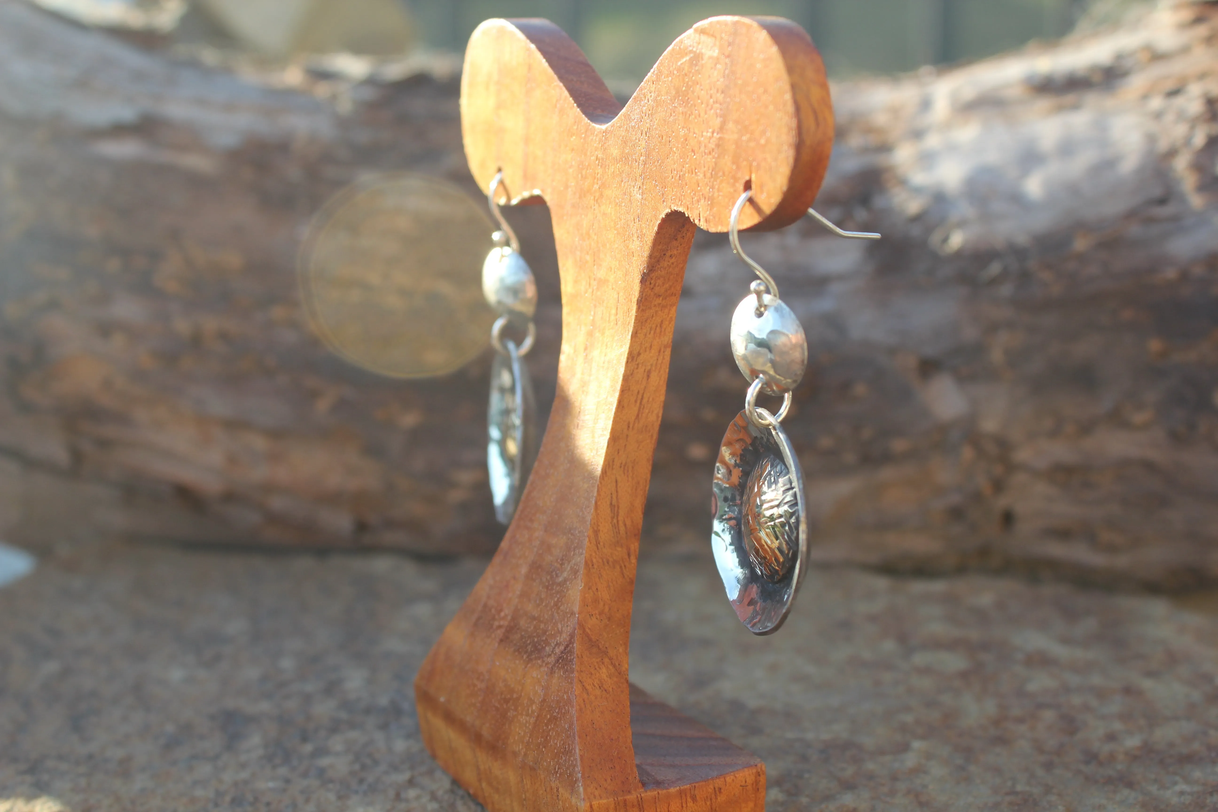 TEXTURED AND DOMED DANGLE STERLING & RED BRASS EARRING