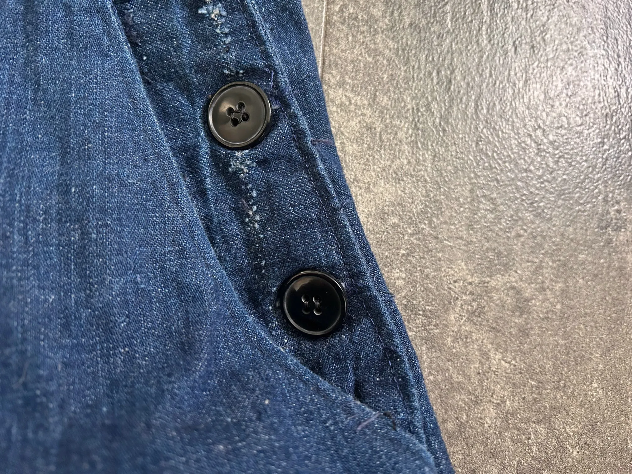Vintage 1940s jeans . buckleback side button denim . 28-29 waist