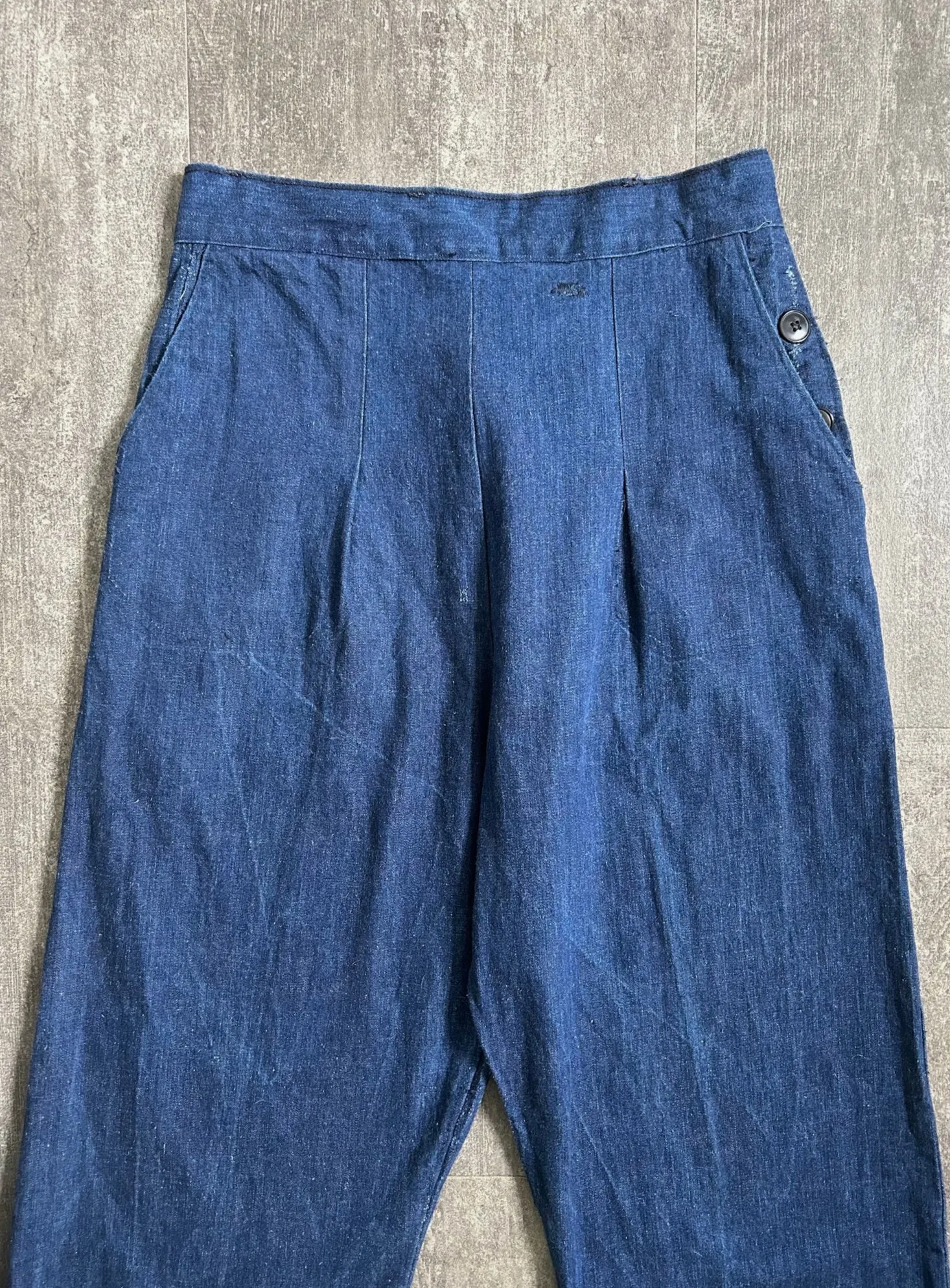Vintage 1940s jeans . buckleback side button denim . 28-29 waist